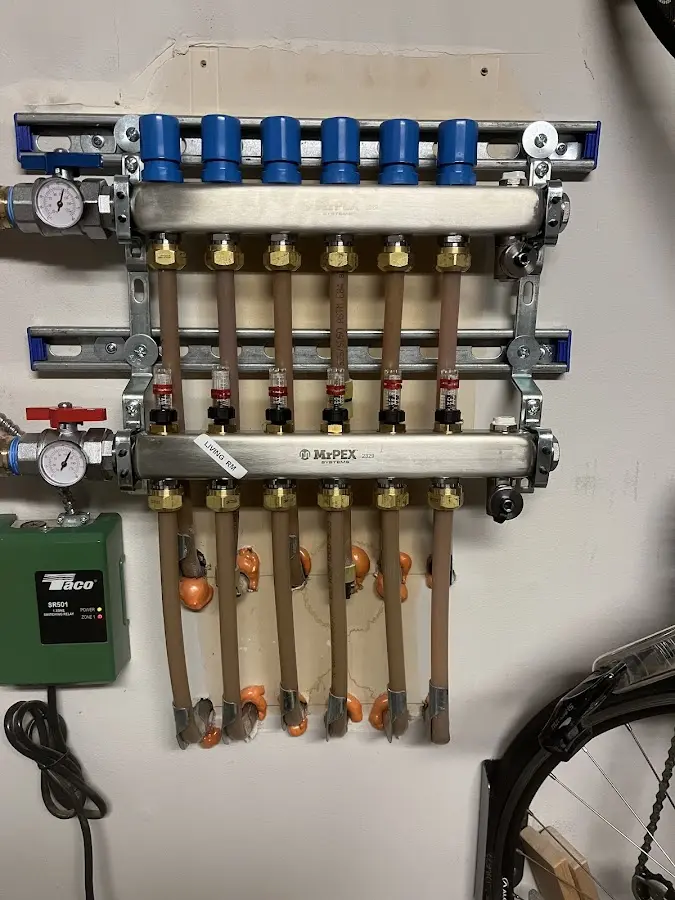 Plumber performing Water Heater Repair at a residential property in Lehman